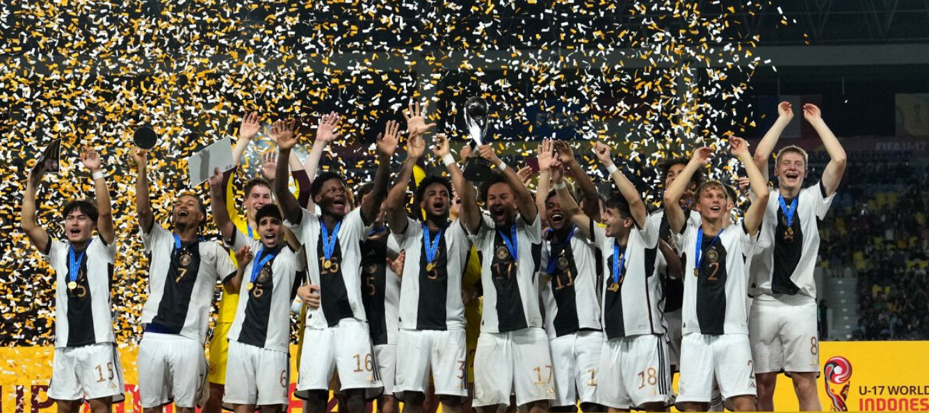 Germany edge France on penalties to clinch title