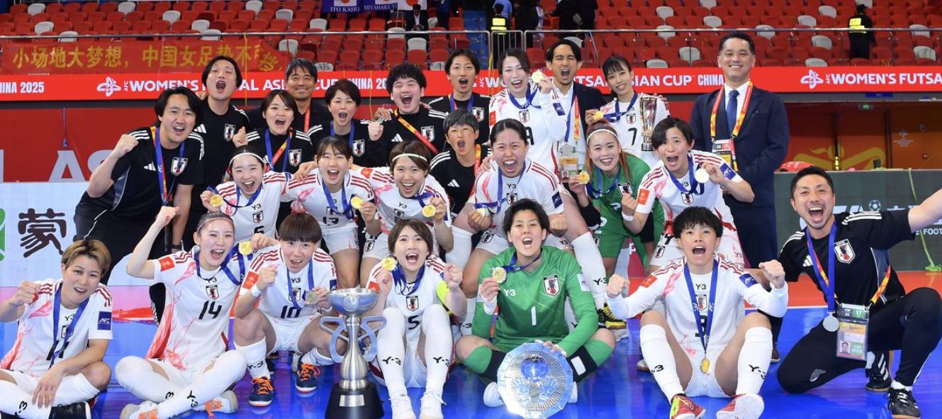 Suga credits Japan’s work ethic for historic triumph